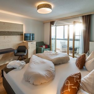 Blick vom Bett aus in den kleinen Wintergarten