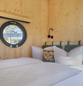 Gemütliches Bett in Tinymobil